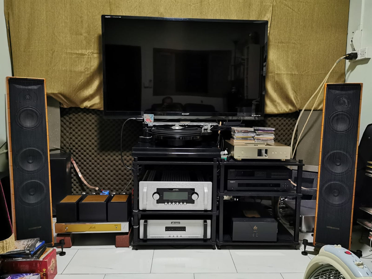 Mr Ng, with his silver BAC 3000